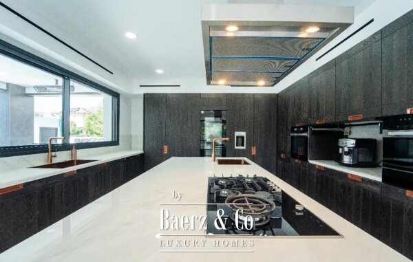 photo 6 Live Steps from the Sea: Brand-New Designer Mansion with Pool, Gym & Smart Home